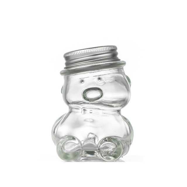 Bear-shaped glass jar packaging, suitable for food and confectionery manufacturers and dessert shops.